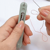 Strumento 2 in 1 per infilare e scucire